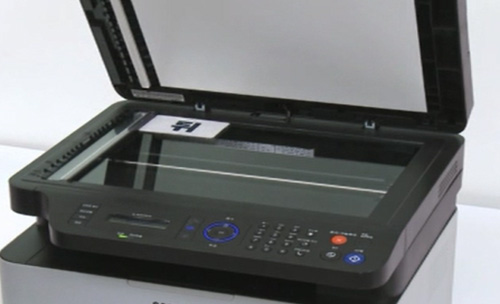 SL-M207x 시리즈에서 신분증 복사하기 위해 상단 덮개를 열어 유리면위에 신분증 앞면 올린 화면