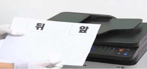 신분증 앞뒤가 용지한장에 복사되어 나온 화면