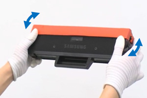 새 토너카트리지를 흔드는 예시 화면